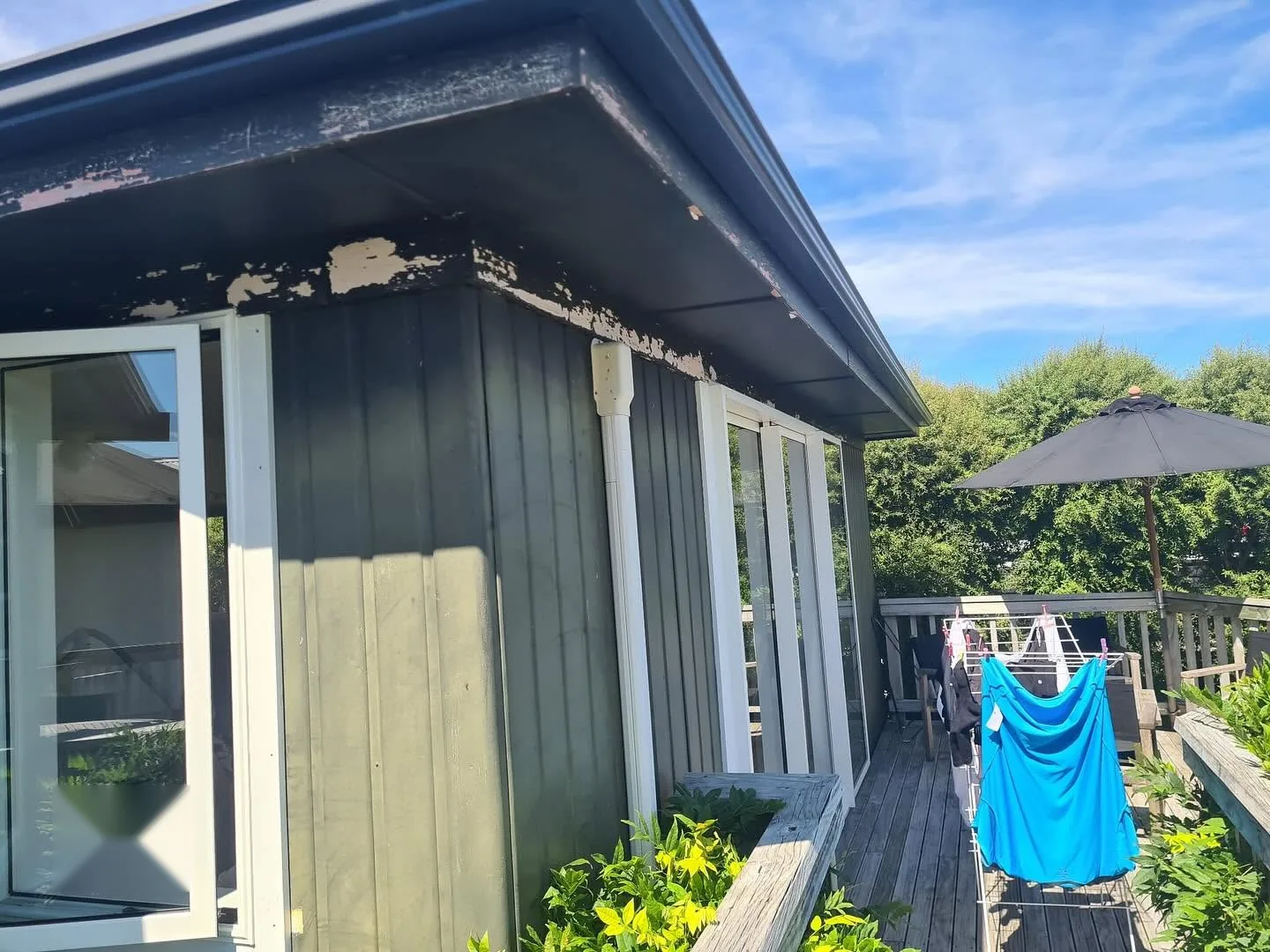 Deck repaint with outdoor living area - before
